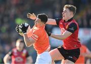 27 April 2024; Aidan Forker of Armagh in action against Ryan Magill of Down during the Ulster GAA Football Senior Championship semi-final match between Down and Armagh at St Tiernach's Park in Clones, Monaghan. Photo by Stephen McCarthy/Sportsfile