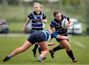 28 April 2024; Niamh Dempsey of Wexford RFC is tackled by Abbey Neale of Athy RFC during the Leinster Girls U18 semi-final match between Athy RFC and Wexford RFC at Athy RFC in Kildare. Photo by Michael P Ryan/Sportsfile