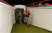 28 April 2024; Limerick captain Laura Fennelly leads her side out before the Munster Senior Camogie Championship quarter-final match between Limerick and Waterford at TUS Gaelic Grounds in Limerick. Photo by Tom Beary/Sportsfile