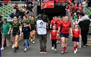 28 April 2024; Railway Union captain Niamh Byrne, left, and UL Bohemian captain Chloe Pearse lead their side's out before the Energia All-Ireland League Women's Division 1 final match between UL Bohemian and Railway Union at the Aviva Stadium in Dublin. Photo by Seb Daly/Sportsfile