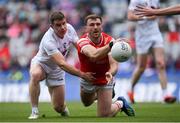 28 April 2024; Sam Mulroy of Louth is tackled by Jack Sargent of Kildare during the Leinster GAA Football Senior Championship semi-final match between Kildare and Louth at Croke Park in Dublin. Photo by Shauna Clinton/Sportsfile
