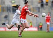 28 April 2024; Tommy Durnin of Louth in action against Paddy McDermott of Kildare during the Leinster GAA Football Senior Championship semi-final match between Kildare and Louth at Croke Park in Dublin. Photo by Shauna Clinton/Sportsfile