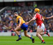 28 April 2024; David Reidy of Clare is tackled by Niall O' Leary of Cork during the Munster GAA Hurling Senior Championship Round 2 match between Cork and Clare at SuperValu Páirc Ui Chaoimh in Cork. Photo by Ray McManus/Sportsfile
