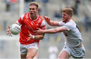 28 April 2024; Conor Grimes of Louth is tackled by Shane Farrell of Kildare during the Leinster GAA Football Senior Championship semi-final match between Kildare and Louth at Croke Park in Dublin. Photo by Shauna Clinton/Sportsfile