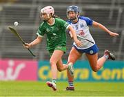 28 April 2024; Orlaith Kelleher of Limerick in action against Aine Power of Waterford during the Munster Senior Camogie Championship quarter-final match between Limerick and Waterford at TUS Gaelic Grounds in Limerick. Photo by Brendan Moran/Sportsfile