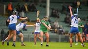 28 April 2024; Rebecca Delee of Limerick in action against Waterford players, from left, Bevan Bowdren, Orla Hickey and Aine Power during the Munster Senior Camogie Championship quarter-final match between Limerick and Waterford at TUS Gaelic Grounds in Limerick. Photo by Brendan Moran/Sportsfile