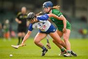 28 April 2024; Alannah McHulty of Waterford in action against Caoimhe Lyons of Limerick during the Munster Senior Camogie Championship quarter-final match between Limerick and Waterford at TUS Gaelic Grounds in Limerick. Photo by Brendan Moran/Sportsfile