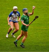 28 April 2024; Marian Quaid of Limerick in action against Roisin Kirwan of Waterford during the Munster Senior Camogie Championship quarter-final match between Limerick and Waterford at TUS Gaelic Grounds in Limerick. Photo by Brendan Moran/Sportsfile