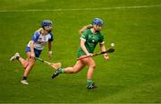 28 April 2024; Marian Quaid of Limerick in action against Annie Fitzgerald of Waterford during the Munster Senior Camogie Championship quarter-final match between Limerick and Waterford at TUS Gaelic Grounds in Limerick. Photo by Brendan Moran/Sportsfile