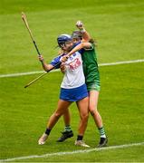 28 April 2024; Annie Fitzgerald of Waterford in action against Cliodhna Ryan of Limerick during the Munster Senior Camogie Championship quarter-final match between Limerick and Waterford at TUS Gaelic Grounds in Limerick. Photo by Brendan Moran/Sportsfile