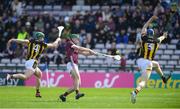 28 April 2024; Brian Concannon of Galway gets a shot off despite the efforts of Kilkenny players from left, Tommy Walsh and Huw Lawlor during the Leinster GAA Hurling Senior Championship Round 2 match between Galway and Kilkenny at Pearse Stadium in Galway. Photo by John Sheridan/Sportsfile