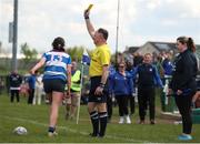 28 April 2024; Julie Nolan of Athy RFC receives a yellow card from referee Gareth Steed during the Leinster Girls U18 semi-final match between Athy RFC and Wexford RFC at Athy RFC in Kildare. Photo by Michael P Ryan/Sportsfile
