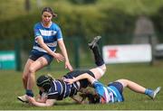 28 April 2024; Emma Walsh of Wexford RFC is tackled by Vivienne Harris of Athy RFC  during the Leinster Girls U18 semi-final match between Athy RFC and Wexford RFC at Athy RFC in Kildare. Photo by Michael P Ryan/Sportsfile