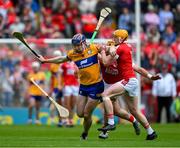 28 April 2024; David Fitzgerald of Clare is tackled by Shane Barrett of Cork during the Munster GAA Hurling Senior Championship Round 2 match between Cork and Clare at SuperValu Páirc Ui Chaoimh in Cork. Photo by Ray McManus/Sportsfile