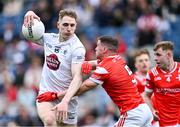 28 April 2024; Daniel Flynn of Kildare in action against Conall McKeever of Louth during the Leinster GAA Football Senior Championship semi-final match between Kildare and Louth at Croke Park in Dublin. Photo by Piaras Ó Mídheach/Sportsfile