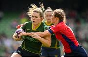 28 April 2024; Patricia Doyle of Railway Union is tackled by Aoife O’Shaughnessy of UL Bohemian during the Energia All-Ireland League Women's Division 1 final match between UL Bohemian and Railway Union at the Aviva Stadium in Dublin. Photo by Seb Daly/Sportsfile