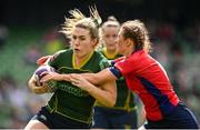 28 April 2024; Patricia Doyle of Railway Union is tackled by Aoife O’Shaughnessy of UL Bohemian during the Energia All-Ireland League Women's Division 1 final match between UL Bohemian and Railway Union at the Aviva Stadium in Dublin. Photo by Seb Daly/Sportsfile