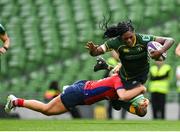 28 April 2024; Faith Oviawe of Railway Union is tackled by Aoife Corey of UL Bohemian during the Energia All-Ireland League Women's Division 1 final match between UL Bohemian and Railway Union at the Aviva Stadium in Dublin. Photo by Seb Daly/Sportsfile