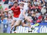 28 April 2024; Daniel Flynn of Kildare is tackled by Ciaran Downey of Louth during the Leinster GAA Football Senior Championship semi-final match between Kildare and Louth at Croke Park in Dublin. Photo by Shauna Clinton/Sportsfile