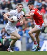 28 April 2024; Daniel Flynn of Kildare is tackled by Ciaran Downey of Louth during the Leinster GAA Football Senior Championship semi-final match between Kildare and Louth at Croke Park in Dublin. Photo by Shauna Clinton/Sportsfile