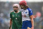 28 April 2024; Clodagh Carroll of Waterford and Orlaith Kelleher of Limerick after the Munster Senior Camogie Championship quarter-final match between Limerick and Waterford at TUS Gaelic Grounds in Limerick. Photo by Tom Beary/Sportsfile