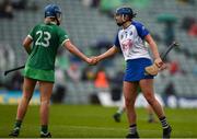 28 April 2024; Bevan Bowdren of Waterford and Lizanna Boylan of Limerick after the Munster Senior Camogie Championship quarter-final match between Limerick and Waterford at TUS Gaelic Grounds in Limerick. Photo by Tom Beary/Sportsfile