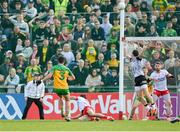 28 April 2024; Brendan McCole of Donegal kicks the final score of normal time, a point, to level the game, before extra-time, during the Ulster GAA Football Senior Championship semi-final match between Donegal and Tyrone at Celtic Park in Derry. Photo by Stephen McCarthy/Sportsfile