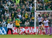 28 April 2024; Brendan McCole of Donegal kicks the final score of normal time, a point, to level the game, before extra-time, during the Ulster GAA Football Senior Championship semi-final match between Donegal and Tyrone at Celtic Park in Derry. Photo by Stephen McCarthy/Sportsfile