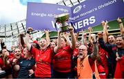 28 April 2024; UL Bohemian captain Chloe Pearse, left, lifts the torphy as she celebrates with teammates after their side's victory in the Energia All-Ireland League Women's Division 1 final match between UL Bohemian and Railway Union at the Aviva Stadium in Dublin. Photo by Seb Daly/Sportsfile