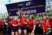 28 April 2024; UL Bohemian players celebrates with the trophy after their side's victory in the Energia All-Ireland League Women's Division 1 final match between UL Bohemian and Railway Union at the Aviva Stadium in Dublin. Photo by Seb Daly/Sportsfile