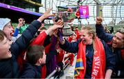 28 April 2024; UL Bohemian head coach Fiona Hayes celebrates with supporters and the trophy after their side's victory in the Energia All-Ireland League Women's Division 1 final match between UL Bohemian and Railway Union at the Aviva Stadium in Dublin. Photo by Seb Daly/Sportsfile