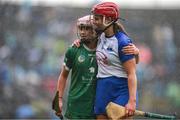 28 April 2024; Clodagh Carroll of Waterford and Orlaith Kelleher of Limerick after the Munster Senior Camogie Championship quarter-final match between Limerick and Waterford at TUS Gaelic Grounds in Limerick. Photo by Tom Beary/Sportsfile
