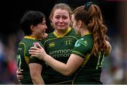 28 April 2024; Railway Union players, from left, Dani Franada, Kirstie Stevenson and Maddy Aberg after their side's defeat in the Energia All-Ireland League Women's Division 1 final match between UL Bohemian and Railway Union at the Aviva Stadium in Dublin. Photo by Seb Daly/Sportsfile
