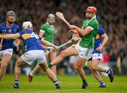 28 April 2024; Barry Nash of Limerick is blocked by Craig Morgan of Tipperary during the Munster GAA Hurling Senior Championship Round 2 match between Limerick and Tipperary at TUS Gaelic Grounds in Limerick. Photo by Brendan Moran/Sportsfile