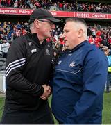 28 April 2024; The Clare and Cork managers, Brian Lohan and Pat Ryan, shake hands after the Munster GAA Hurling Senior Championship Round 2 match between Cork and Clare at SuperValu Páirc Ui Chaoimh in Cork. Photo by Ray McManus/Sportsfile