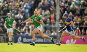 28 April 2024; Cathal O'Neill of Limerick in action against Willie Connors of Tipperary during the Munster GAA Hurling Senior Championship Round 2 match between Limerick and Tipperary at TUS Gaelic Grounds in Limerick. Photo by Brendan Moran/Sportsfile