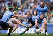 28 April 2024; John Furlong of Offaly has a shot on goal blocked by Paul Mannion of Dublin during the Leinster GAA Football Senior Championship semi-final match between Dublin and Offaly at Croke Park in Dublin. Photo by Shauna Clinton/Sportsfile
