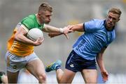 28 April 2024; David Dempsey of Offaly in action against Paul Mannion of Dublin during the Leinster GAA Football Senior Championship semi-final match between Dublin and Offaly at Croke Park in Dublin. Photo by Shauna Clinton/Sportsfile
