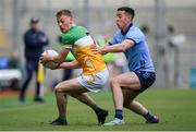 28 April 2024; Peter Cunningham of Offaly is tackled by Cormac Costello of Dublin during the Leinster GAA Football Senior Championship semi-final match between Dublin and Offaly at Croke Park in Dublin. Photo by Shauna Clinton/Sportsfile