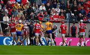 28 April 2024; Players from both side's jostle near the end of the Munster GAA Hurling Senior Championship Round 2 match between Cork and Clare at SuperValu Páirc Ui Chaoimh in Cork. Photo by Ray McManus/Sportsfile