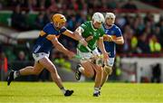 28 April 2024; Aaron Gillane of Limerick is tackled by Ronan Maher of Tipperary during the Munster GAA Hurling Senior Championship Round 2 match between Limerick and Tipperary at TUS Gaelic Grounds in Limerick. Photo by Brendan Moran/Sportsfile