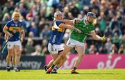 28 April 2024; David Reidy of Limerick is tackled by Johnny Ryan of Tipperary during the Munster GAA Hurling Senior Championship Round 2 match between Limerick and Tipperary at TUS Gaelic Grounds in Limerick. Photo by Brendan Moran/Sportsfile