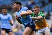 28 April 2024; Colm Basquel of Dublin is tackled by David Dempsey of Offaly during the Leinster GAA Football Senior Championship semi-final match between Dublin and Offaly at Croke Park in Dublin. Photo by Shauna Clinton/Sportsfile