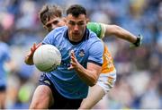 28 April 2024; Colm Basquel of Dublin is tackled by Cathal Donoghue of Offaly during the Leinster GAA Football Senior Championship semi-final match between Dublin and Offaly at Croke Park in Dublin. Photo by Shauna Clinton/Sportsfile