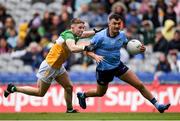 28 April 2024; Colm Basquel of Dublin is tackled by Lee Pearson of Offaly during the Leinster GAA Football Senior Championship semi-final match between Dublin and Offaly at Croke Park in Dublin. Photo by Shauna Clinton/Sportsfile