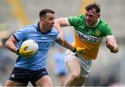 28 April 2024; Cormac Costello of Dublin is tackled by Jordan Hayes of Offaly during the Leinster GAA Football Senior Championship semi-final match between Dublin and Offaly at Croke Park in Dublin. Photo by Shauna Clinton/Sportsfile