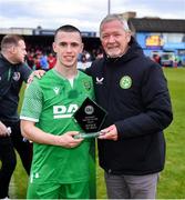 28 April 2024; Ryan O'Shea of Glebe North is presented the player of the match award by Dave Norton after the FAI Intermediate Cup Final between Glebe North FC of the Leinster Senior League and Ringmahon Rangers FC of the Munster Senior League at Weaver's Park in Drogheda, Louth. Photo by Ben McShane/Sportsfile