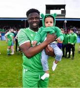 28 April 2024; Olayinka Hamzat of Glebe North celebrates with daughter Safiya, age 18 months, after the FAI Intermediate Cup Final between Glebe North FC of the Leinster Senior League and Ringmahon Rangers FC of the Munster Senior League at Weaver's Park in Drogheda, Louth. Photo by Ben McShane/Sportsfile