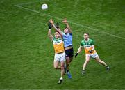 28 April 2024; Colm Basquel of Dublin in action against Declan Hogan, left, and Lee Pearson of Offaly during the Leinster GAA Football Senior Championship semi-final match between Dublin and Offaly at Croke Park in Dublin. Photo by Piaras Ó Mídheach/Sportsfile