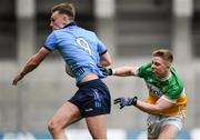 28 April 2024; Tom Lahiff of Dublin is tackled by Lee Pearson of OffalyLee Pearson during the Leinster GAA Football Senior Championship semi-final match between Dublin and Offaly at Croke Park in Dublin. Photo by Shauna Clinton/Sportsfile